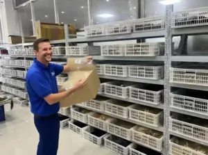 Large inventory of YELUX hair products neatly organized in a modern warehouse, ready for wholesale distribution and demonstrating a reliable B2B supply chain.